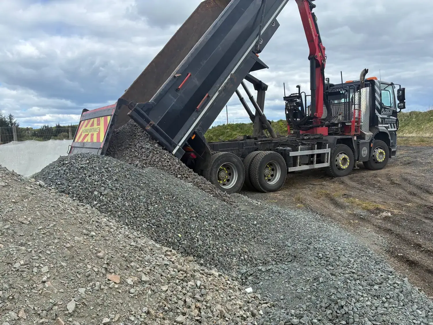 Grab Hire Scotland tipper delivering crushed aggregate