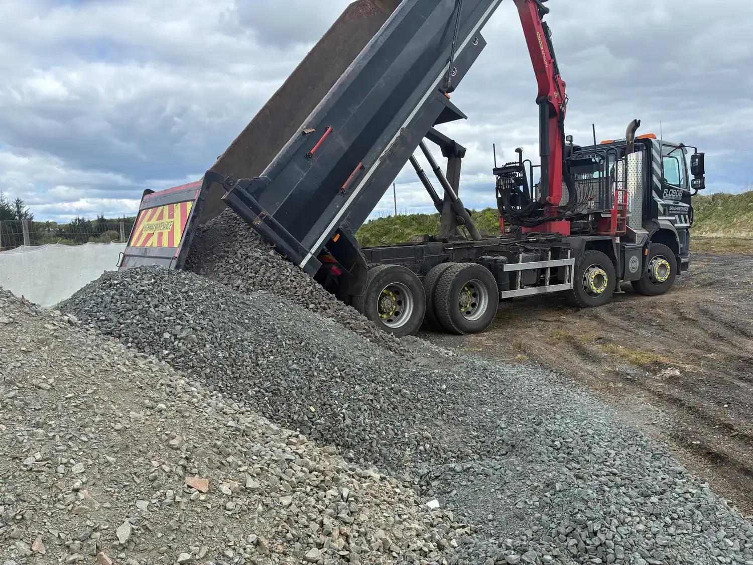 Grab Hire Scotland truck delivering responsibly sourced aggregate