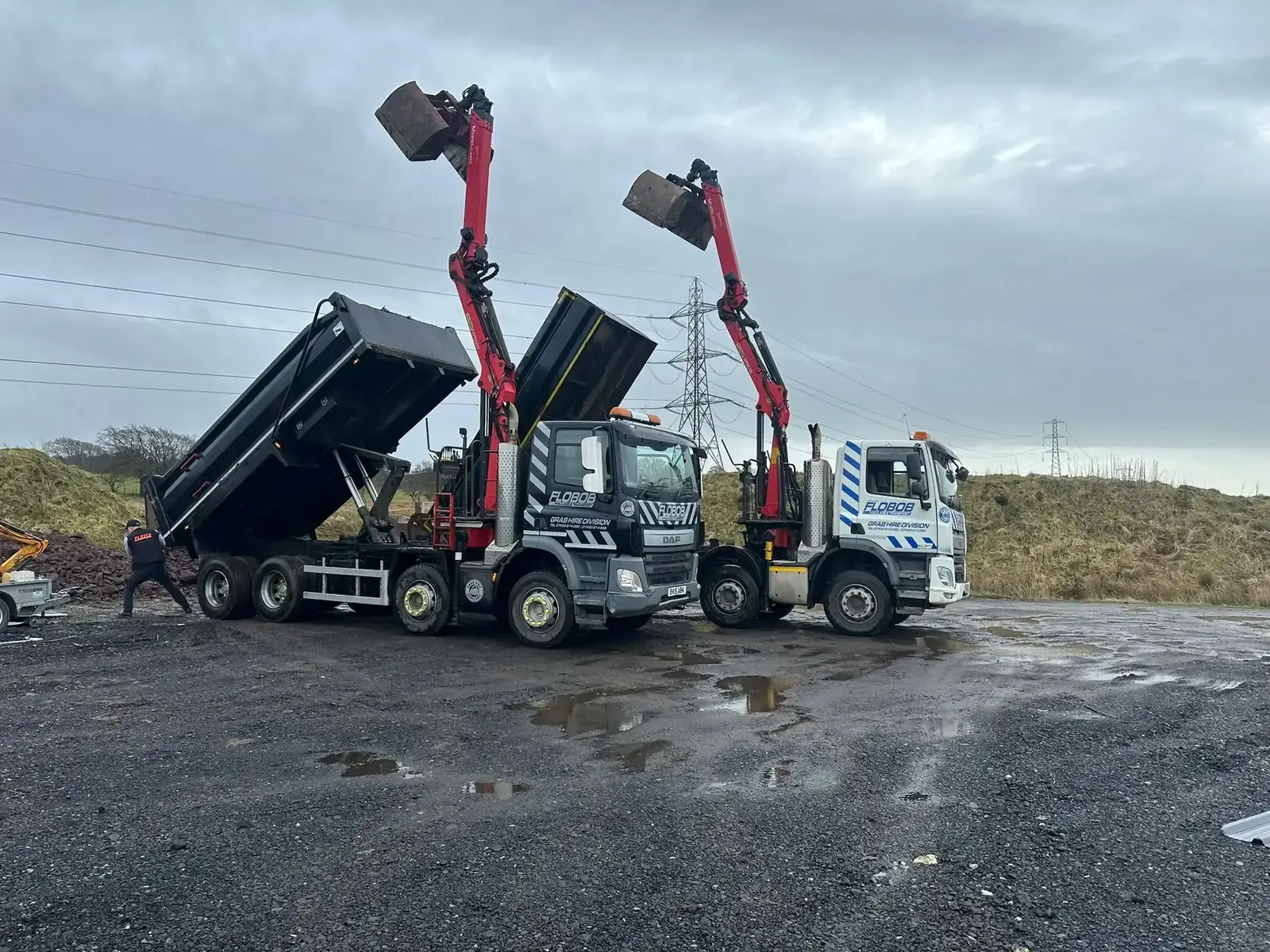 Two Grab Hire Scotland trucks serving Beith
